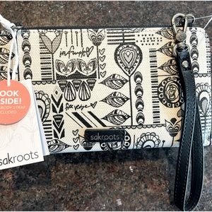 Brand new sakroots wallet still has packaging.